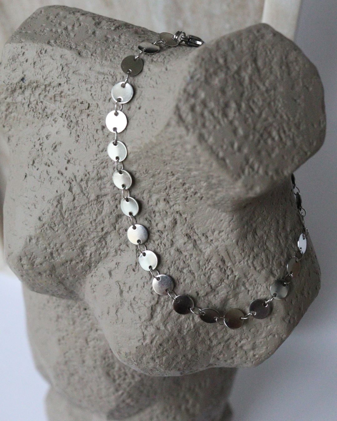 pulseira de pé em aço ALANA